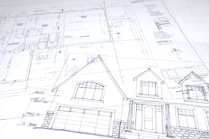 Residential architect preparing house blueprints | Building Dreams Residential architect preparing house blueprints | Building Dreams